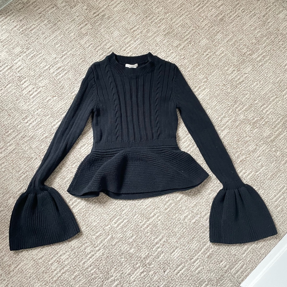 Urban Outfitter black sweater with flower shape sleeves